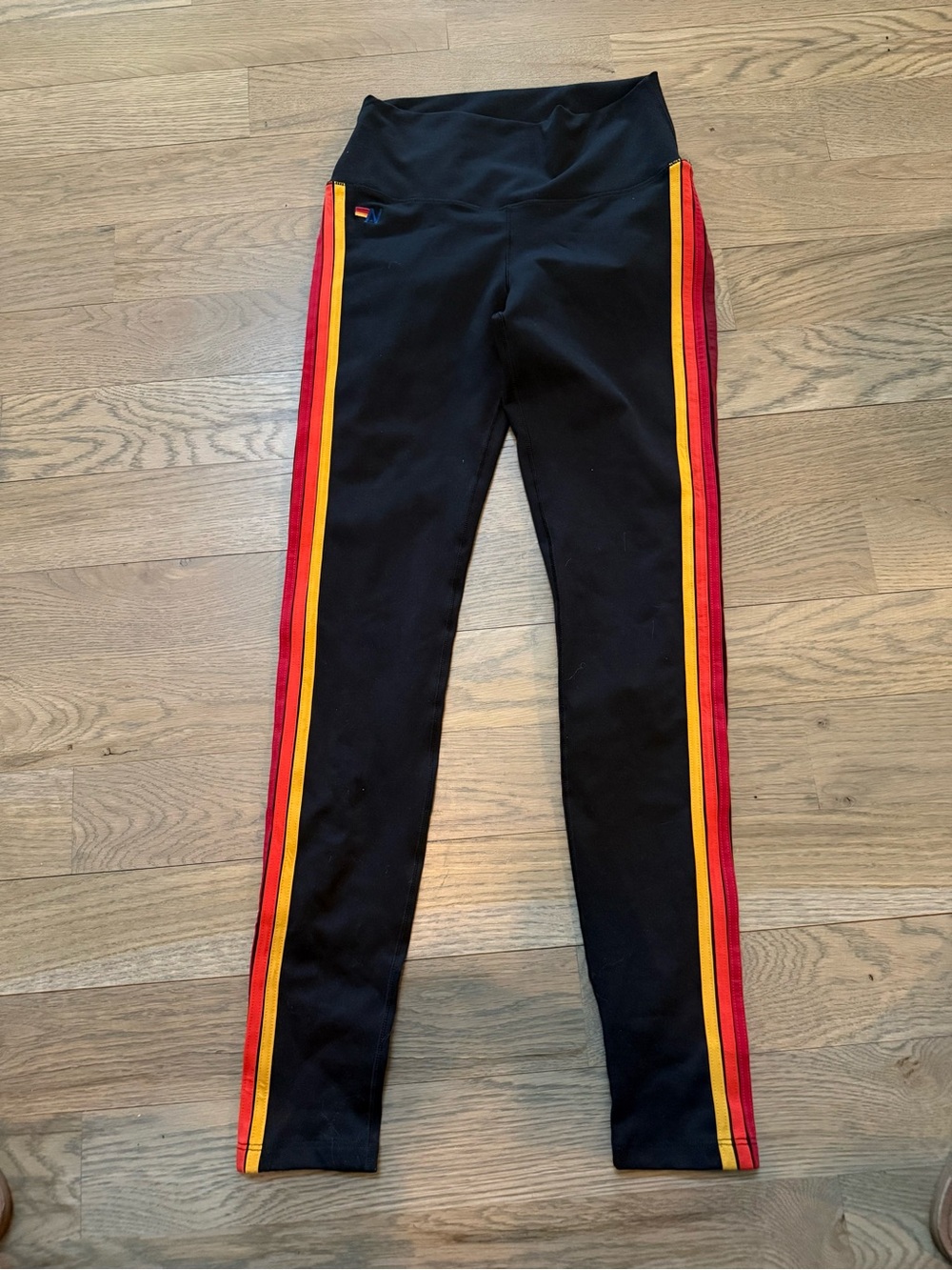 Aviator Nation Black Leggings with Red and Yellow Side Stripes